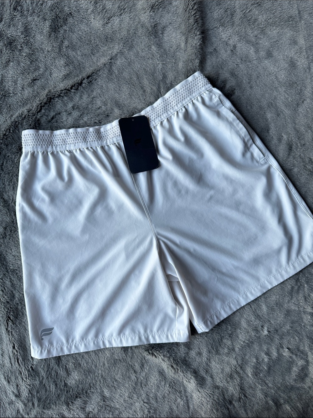 Fabletics Men’s White Athletic Shorts with Subtle Logo